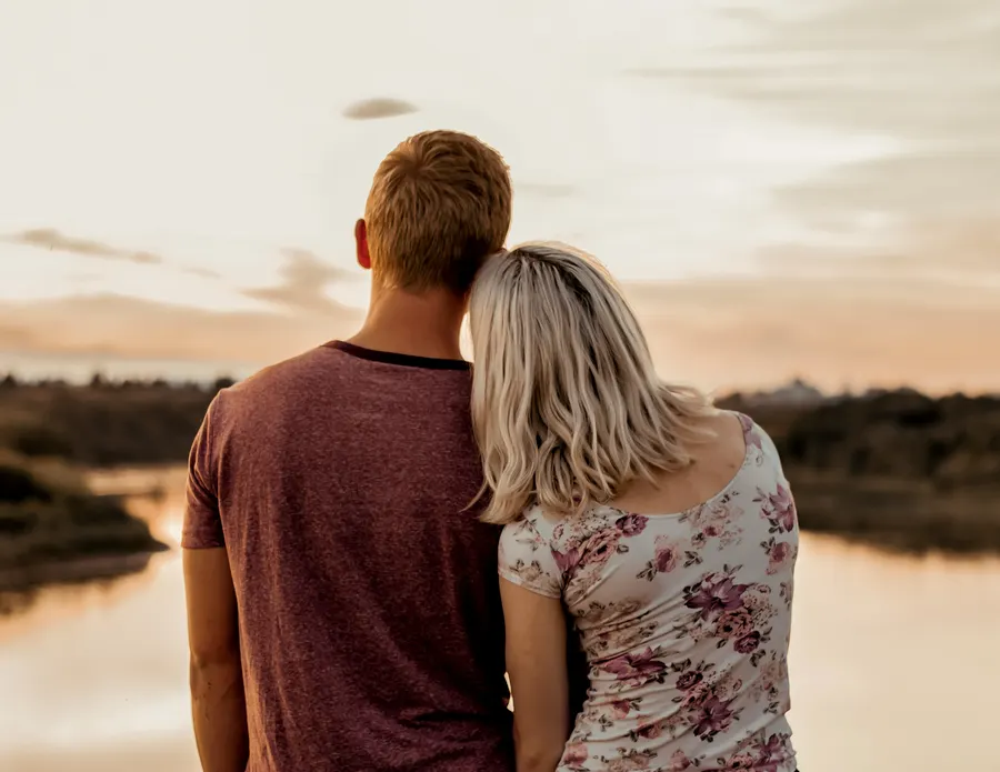 Couple watching the sunset together